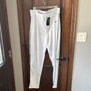 Nike White Athletic Pants- Green swoosh and green pipping.